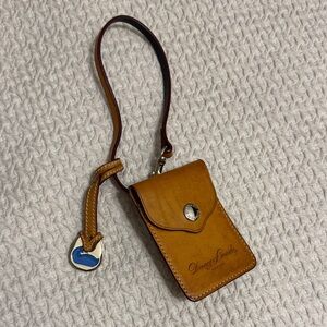 Dooney & Bourke Tan Leather wristlet/tag with charm